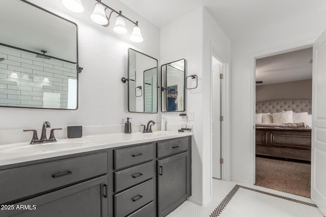 4135 E Waterman Ct, Gilbert, AZ 85297 - ensuite bathroom featuring double vanity and tile patterned flooring