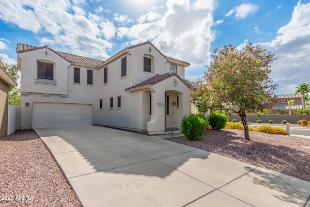 4135 E Waterman Ct, Gilbert, AZ 85297 - mediterranean / spanish house with a tiled roof, concrete driveway, a garage, stucco siding, and fence