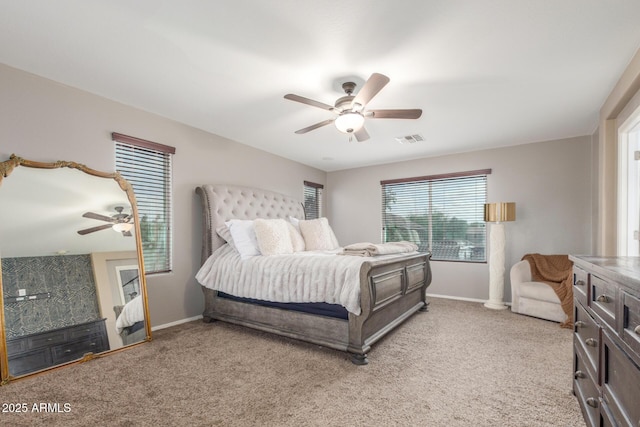 4135 E Waterman Ct, Gilbert, AZ 85297 - bedroom with baseboards, light carpet, and a ceiling fan