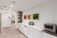 hallway featuring recessed lighting