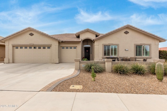 view of front of property with a garage