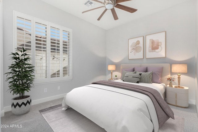 carpeted bedroom featuring ceiling fan