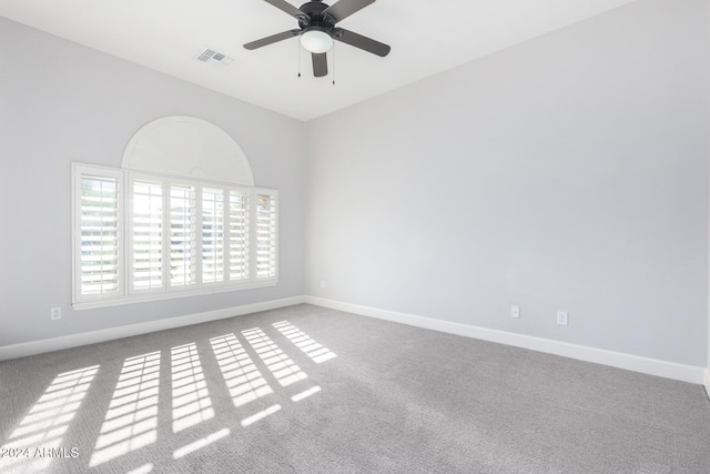 unfurnished room featuring carpet flooring and ceiling fan