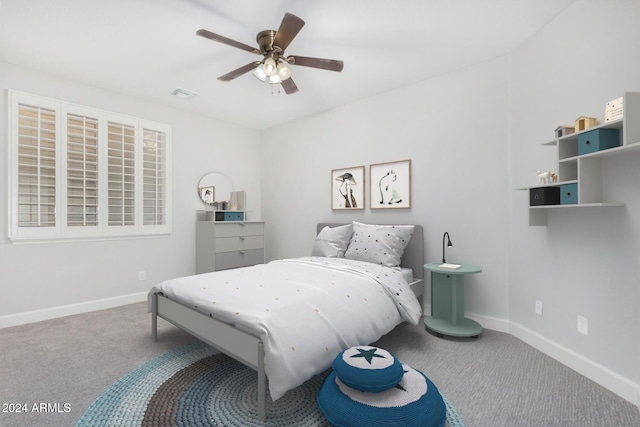 carpeted bedroom featuring ceiling fan