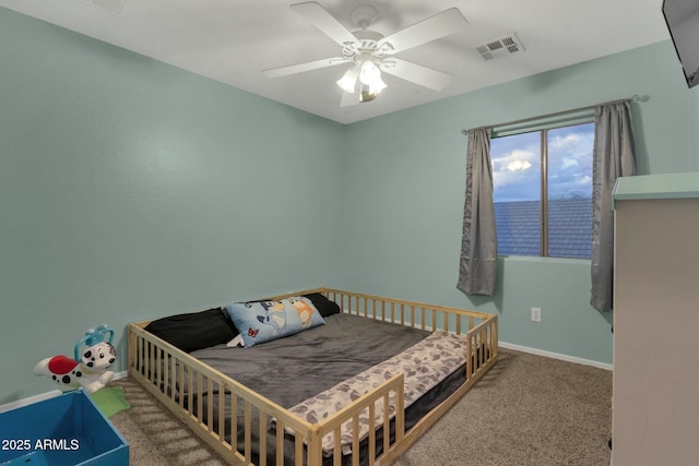 bedroom featuring visible vents, baseboards, carpet, and ceiling fan