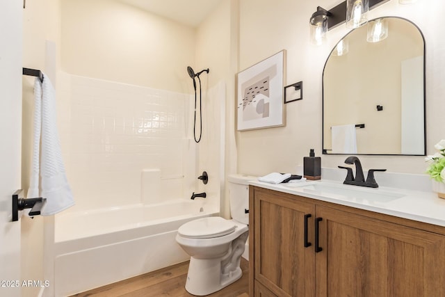 10276 E Meandering Trail Ln, Gold Canyon, AZ 85118 - bathroom featuring wood finished floors, toilet, vanity, and washtub / shower combination