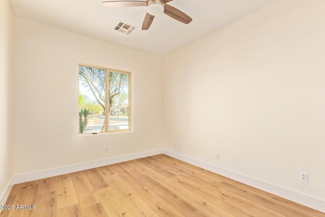 10276 E Meandering Trail Ln, Gold Canyon, AZ 85118 - unfurnished room featuring baseboards, light wood finished floors, and ceiling fan