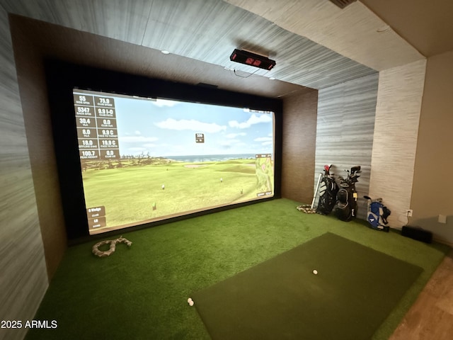 recreation room with golf simulator and carpet floors