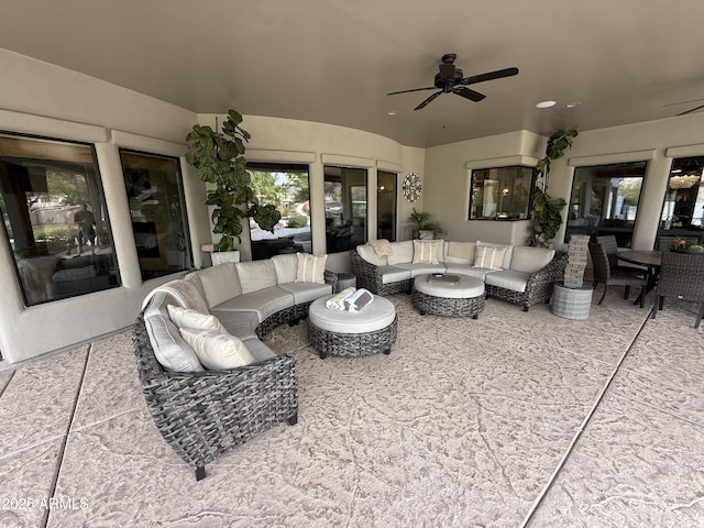 view of patio featuring outdoor lounge area and a ceiling fan