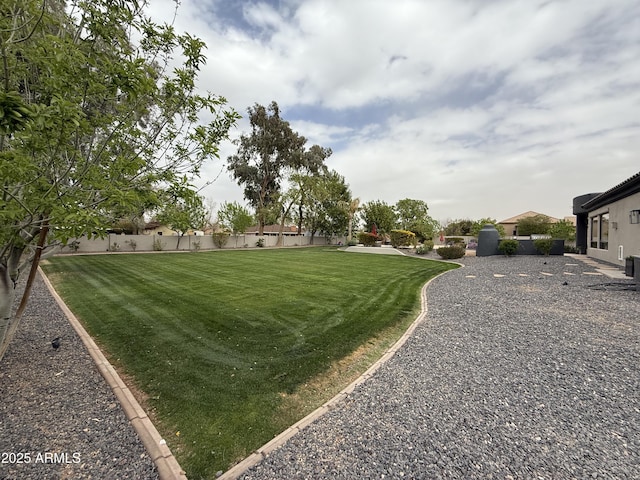 view of yard with fence