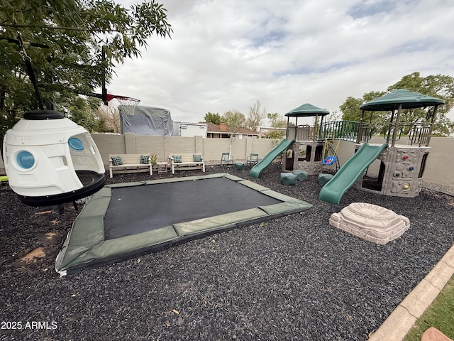 communal playground featuring fence