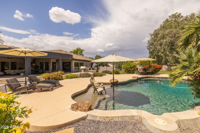690 E Seattle Slew Ln, Gilbert, AZ 85296 - view of swimming pool with a patio area and an outdoor living space