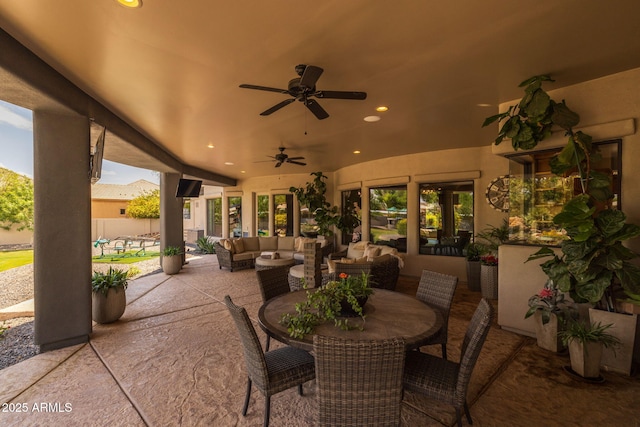 690 E Seattle Slew Ln, Gilbert, AZ 85296 - view of patio with a ceiling fan and an outdoor living space