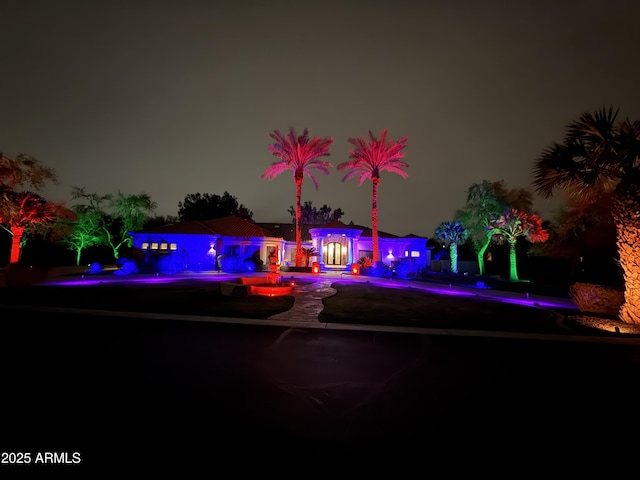 690 E Seattle Slew Ln, Gilbert, AZ 85296 - property at night featuring a pool