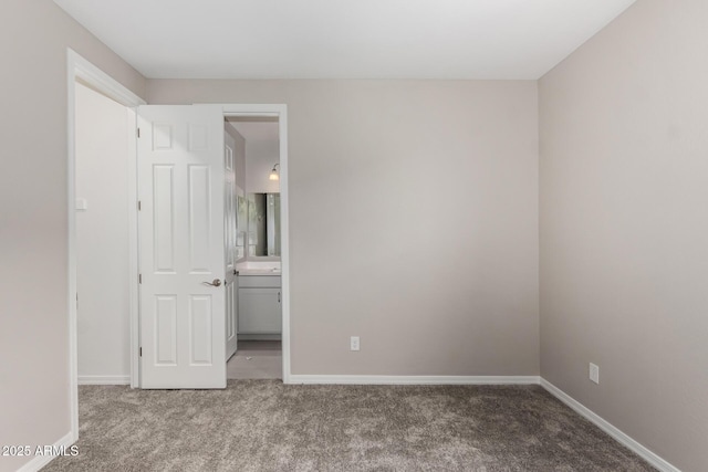 spare room with carpet floors