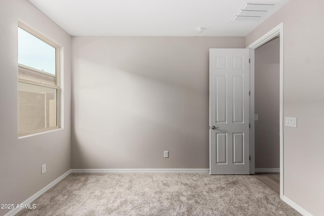 view of carpeted spare room