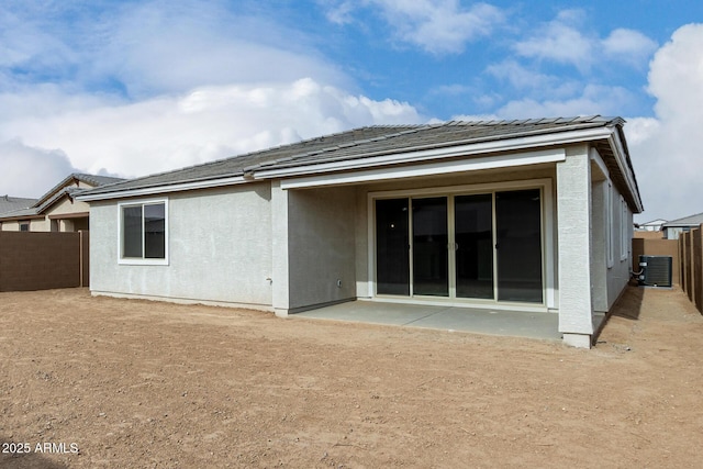 back of house featuring a patio and central air condition unit