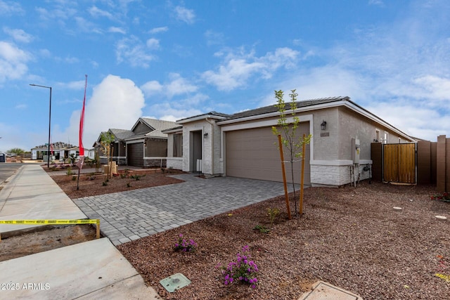 ranch-style home featuring a garage