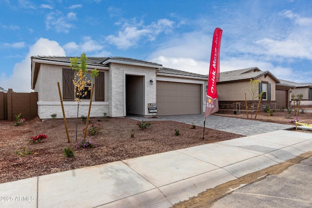 view of front of home featuring a garage