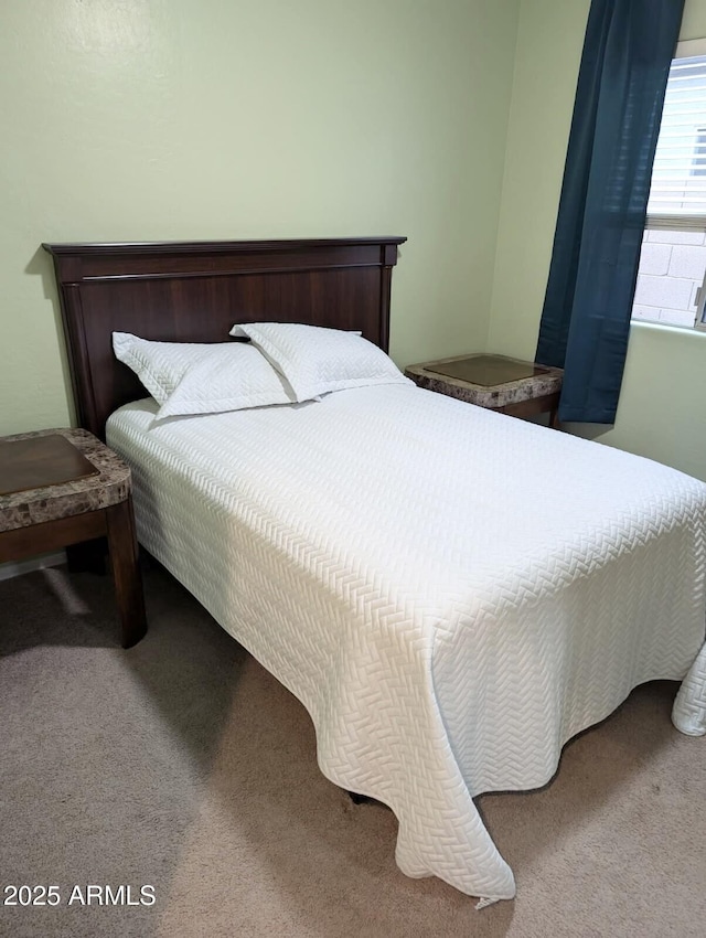 bedroom featuring carpet