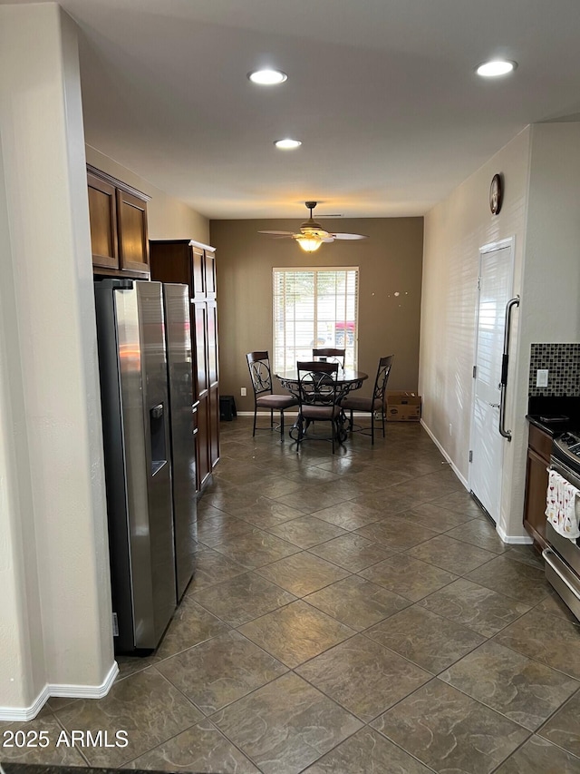 kitchen featuring ceiling fan, appliances with stainless steel finishes, baseboards, and recessed lighting