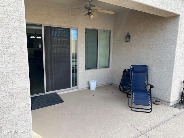 view of patio / terrace with a ceiling fan