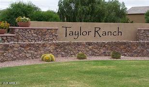 community sign featuring a lawn