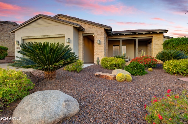 view of front of property featuring a garage