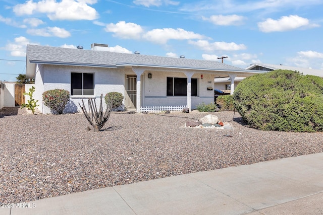 10806 N 114th Ave, Youngtown, AZ 85363 - ranch-style home featuring stucco siding, a chimney, and roof with shingles