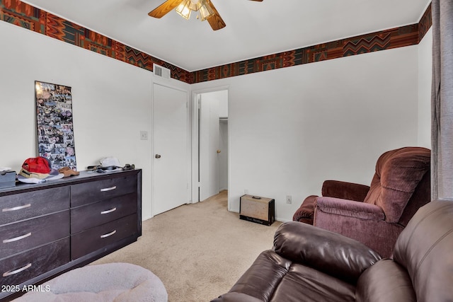 10806 N 114th Ave, Youngtown, AZ 85363 - sitting room with light colored carpet, visible vents, and ceiling fan