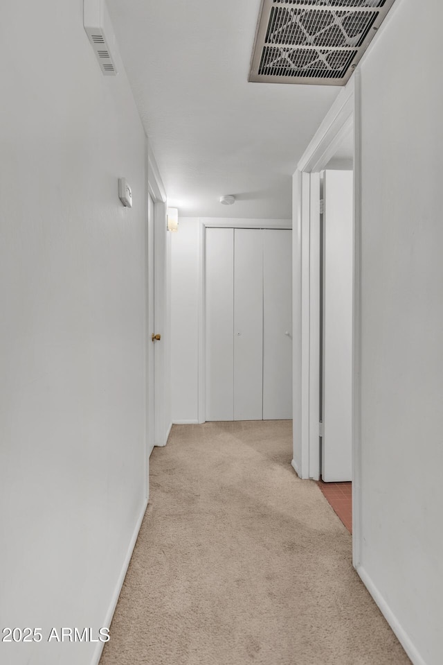 10806 N 114th Ave, Youngtown, AZ 85363 - corridor featuring baseboards, visible vents, and carpet