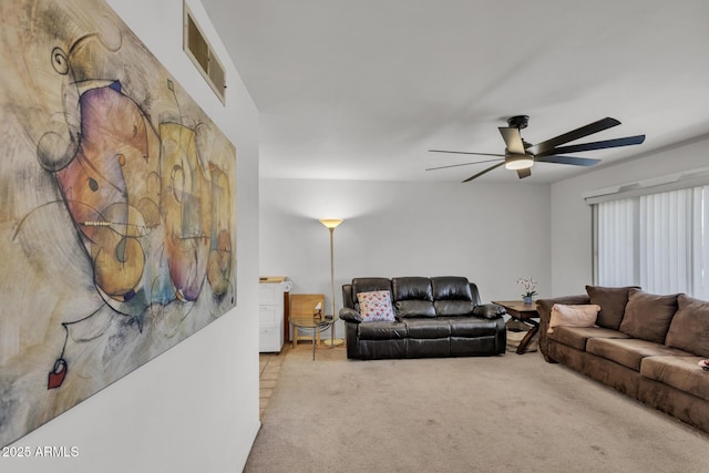 10806 N 114th Ave, Youngtown, AZ 85363 - living area featuring visible vents, ceiling fan, and carpet floors
