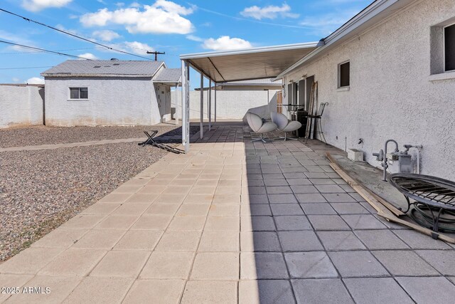 10806 N 114th Ave, Youngtown, AZ 85363 - view of patio featuring fence