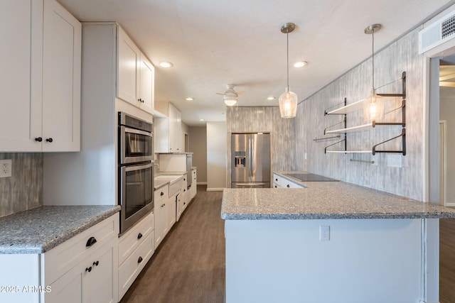 kitchen featuring stainless steel appliances, open shelves, visible vents, recessed lighting, and dark wood-style flooring