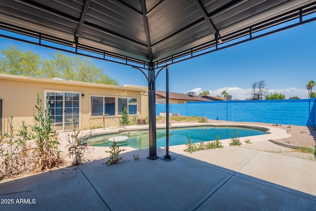 view of pool with a fenced backyard, a patio area, and a fenced in pool