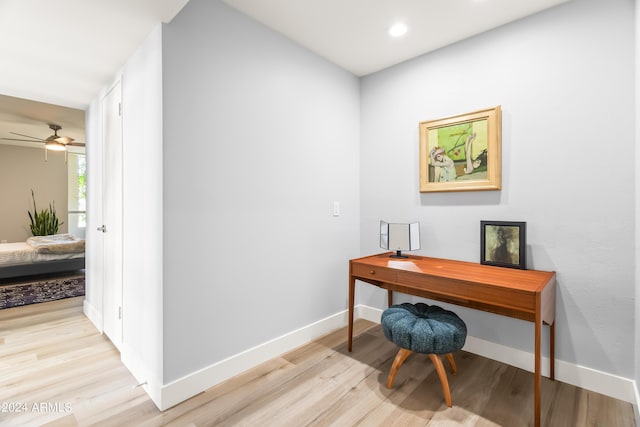 office area featuring ceiling fan and light hardwood / wood-style floors