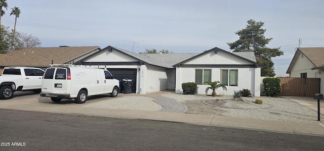 ranch-style home with a garage