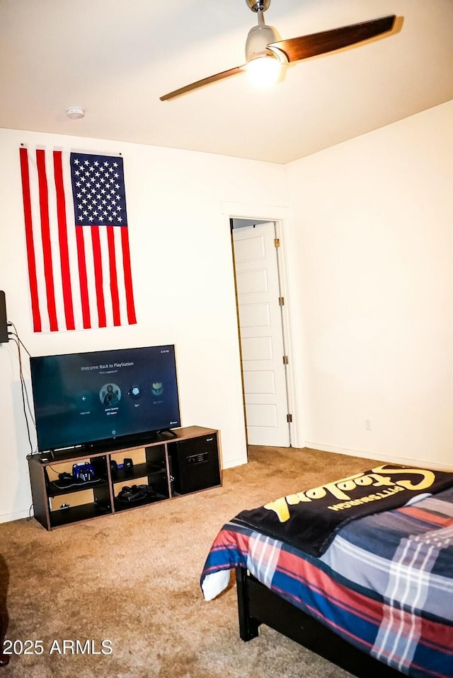 bedroom featuring carpet floors and ceiling fan