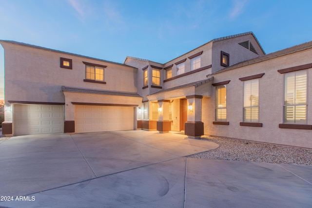 view of front of home with a garage