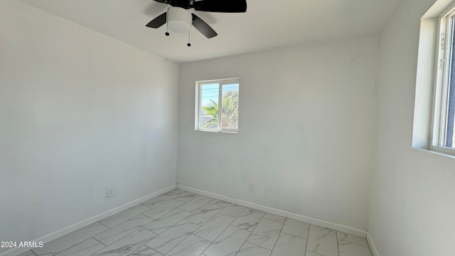 empty room featuring ceiling fan