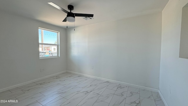 empty room featuring ceiling fan