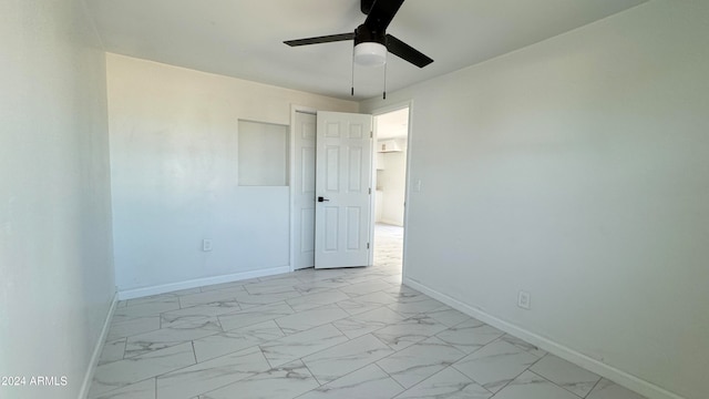 spare room featuring ceiling fan