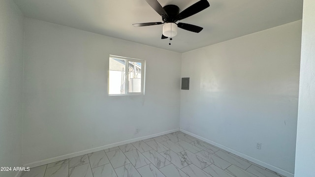 empty room featuring ceiling fan