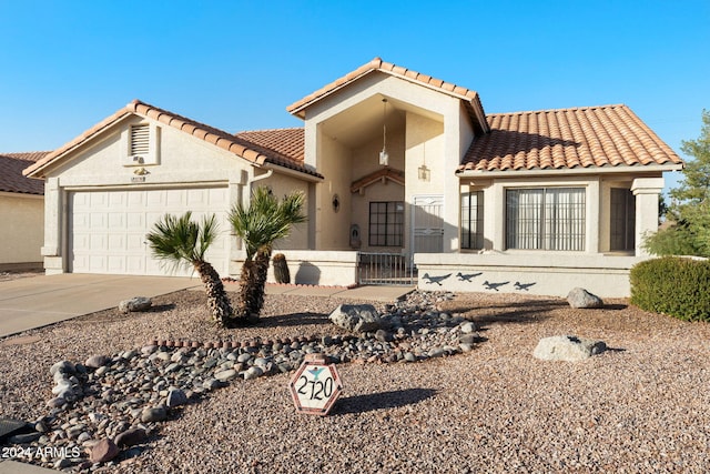 view of front of home with a garage