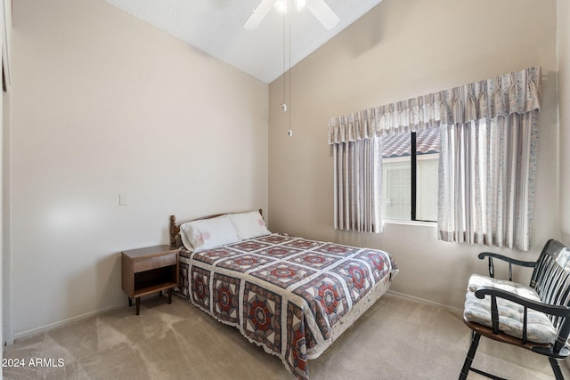 carpeted bedroom with ceiling fan and lofted ceiling