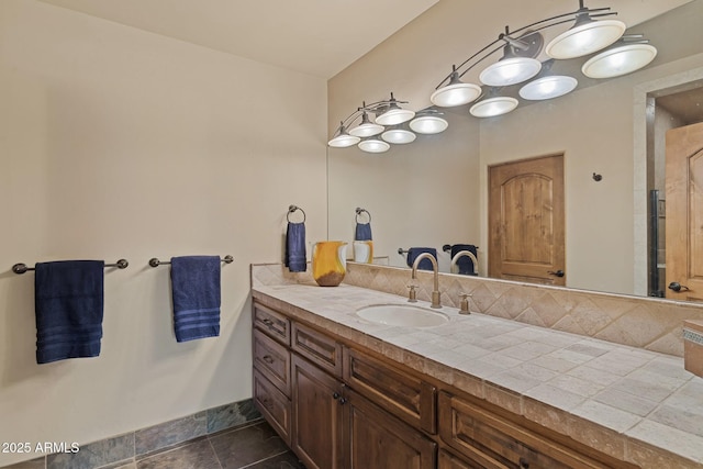 bathroom featuring tile patterned floors and vanity