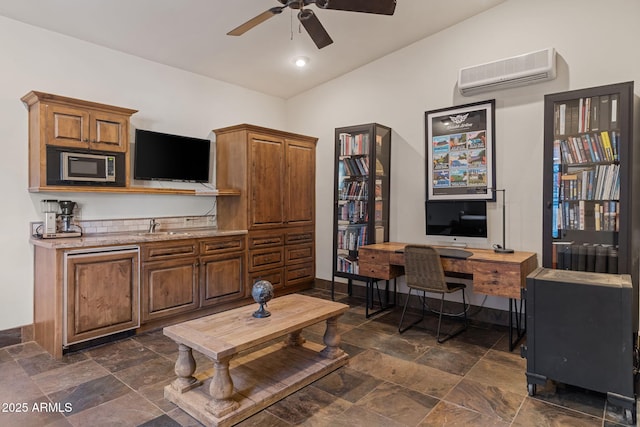 interior space featuring vaulted ceiling, a wall unit AC, ceiling fan, and sink