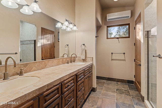 bathroom featuring a wall mounted air conditioner, a chandelier, and vanity