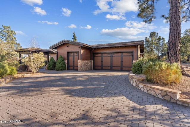 view of front of property with a garage