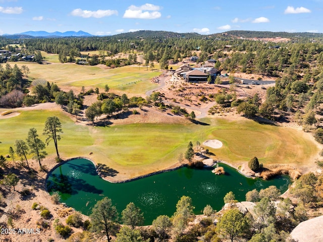 bird's eye view with a water and mountain view